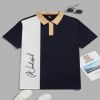 Áo thun cổ trụ - màu đen có mảng trắng bên phải